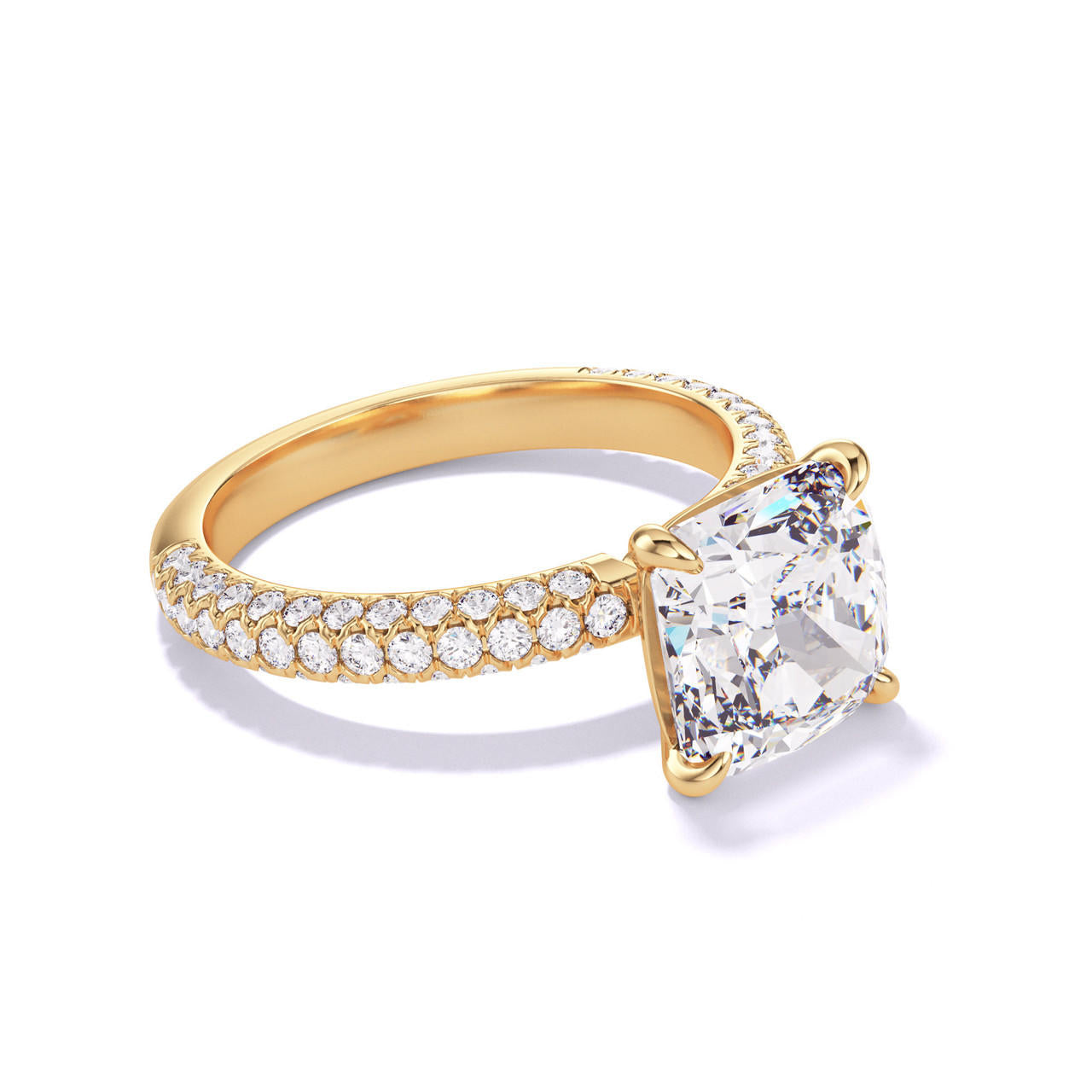 CUSHION CUT DIAMOND ENGAGEMENT RING WITH A CLASSIC 4 PRONG THREE PHASES TRIPLE PAVE SETTING IN 18K YELLOW GOLD