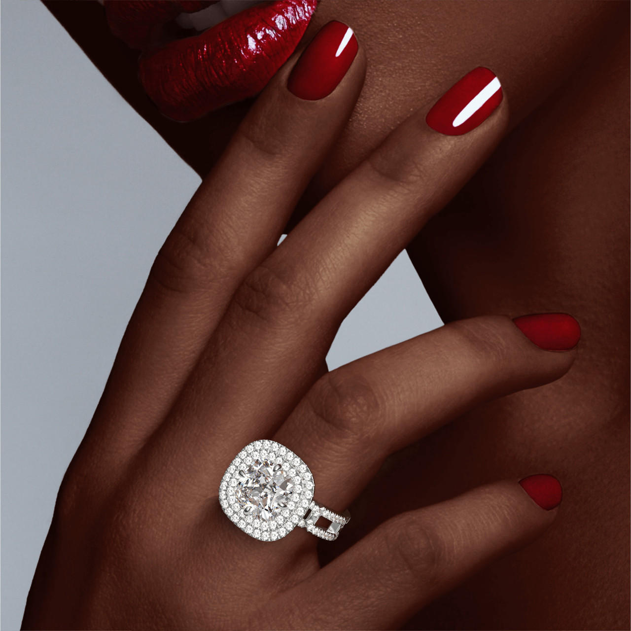 CUSHION CUT DIAMOND ENGAGEMENT RING WITH A DOUBLE HALO 8 PAVE LINKS SETTING IN PLATINUM