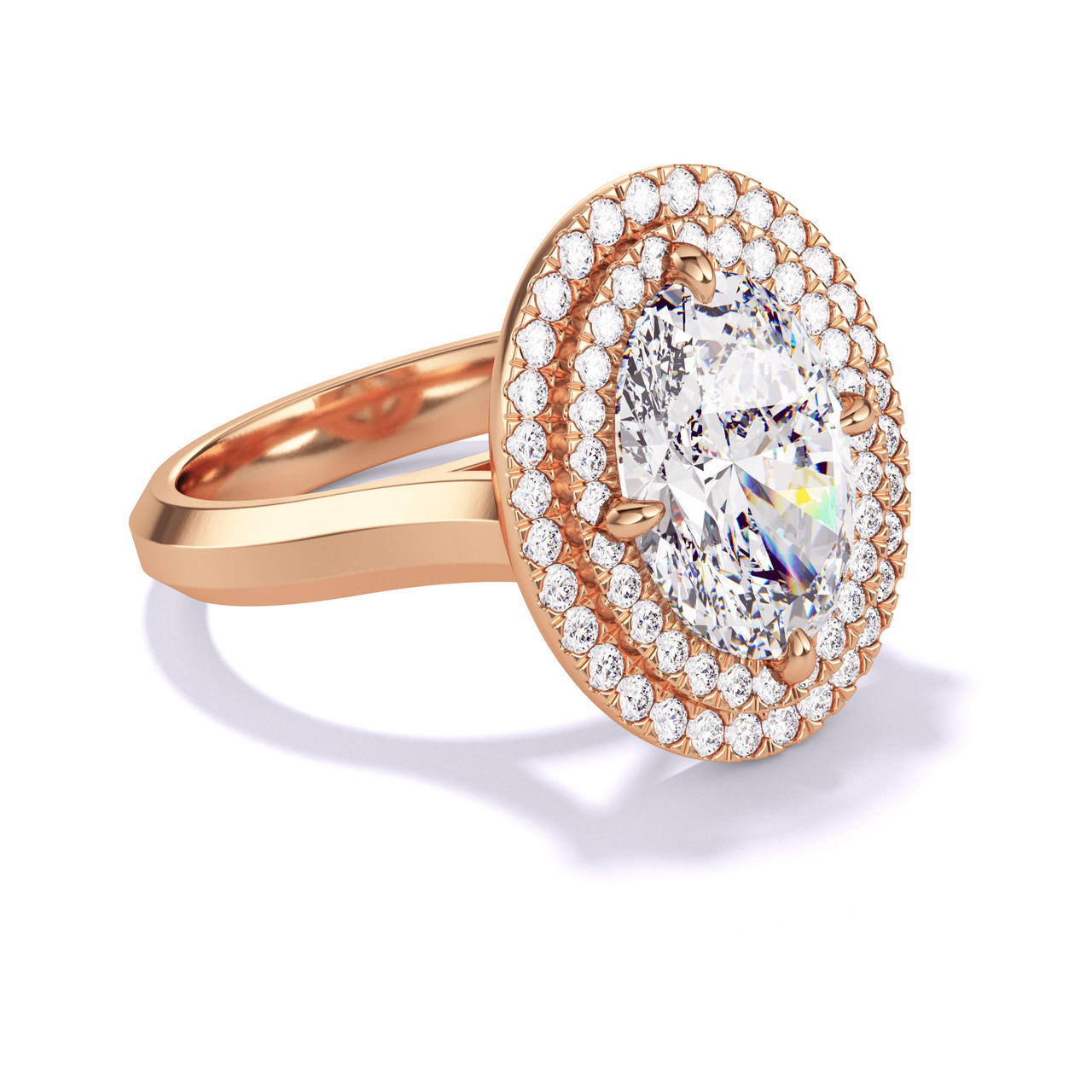 OVAL CUT DIAMOND ENGAGEMENT RING WITH A DOUBLE HALO THREE PHASES SETTING IN 18K ROSE GOLD