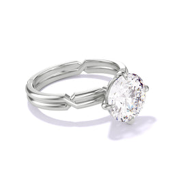 Round cut diamond engagement ring with a compass 4 prong chance setting in platinum