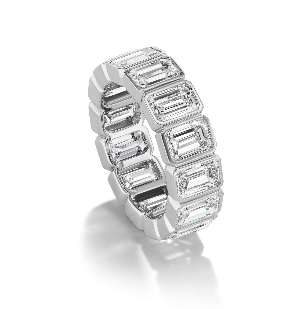 Bezel-set-emerald-cut-diamond-eternity-band-platinum