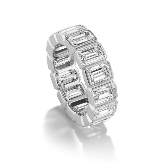 Bezel-set-emerald-cut-diamond-eternity-band-platinum