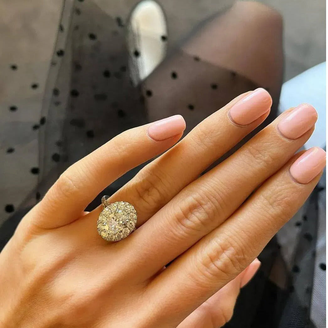 oval halo engagement ring platinum