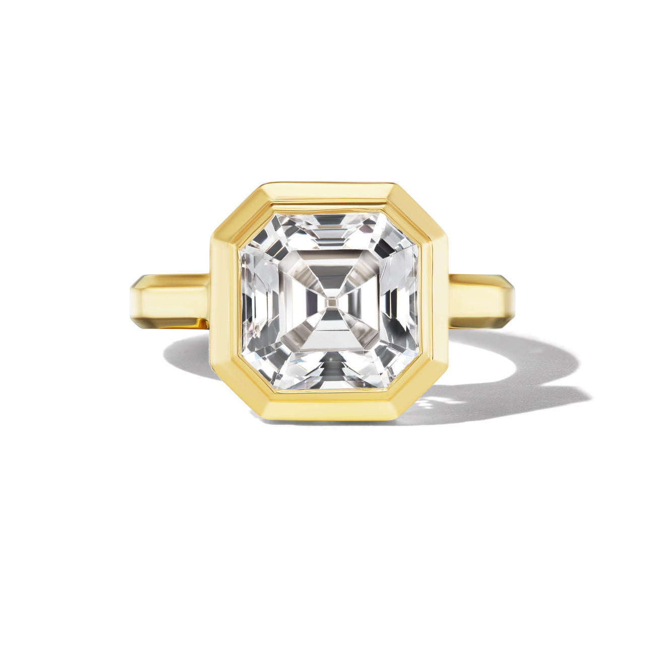 shield bezel set asscher cut diamond engagement ring in 18k yellow gold