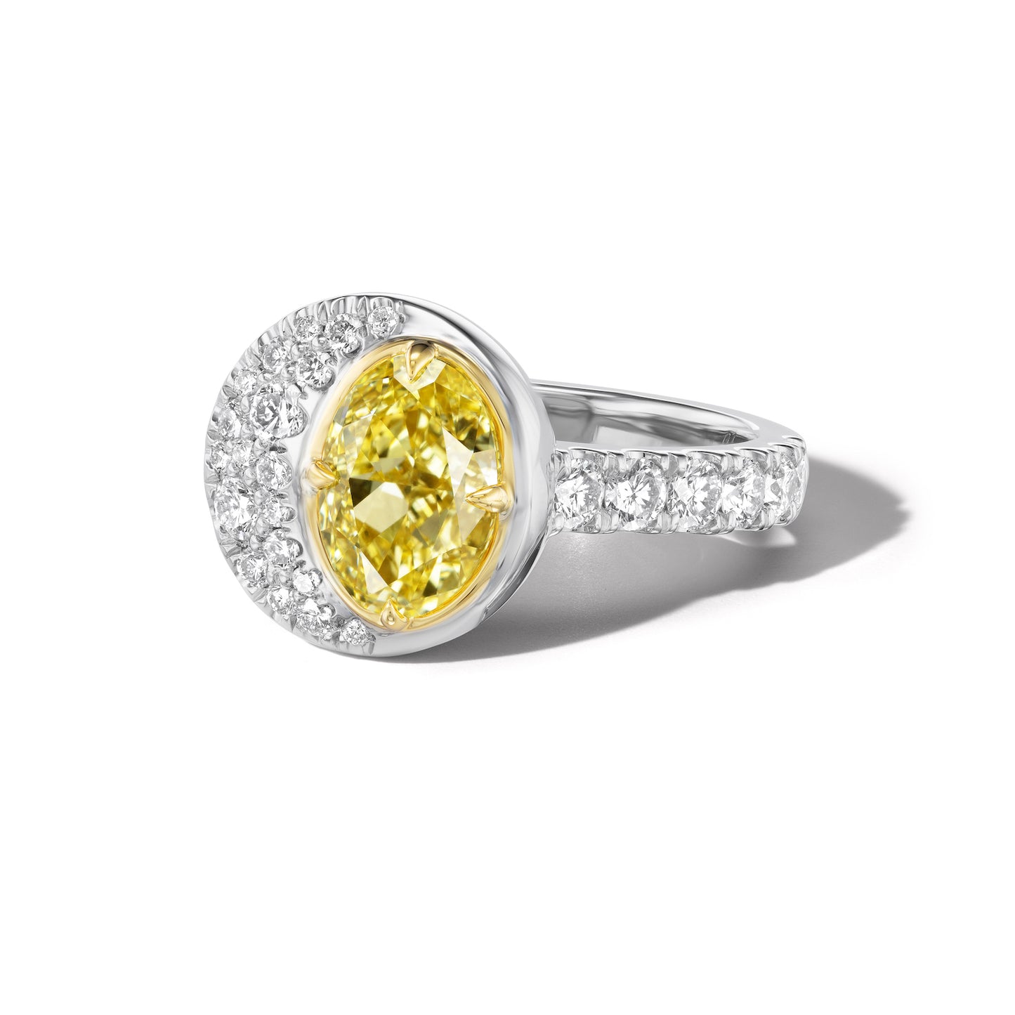 Angled view of Oval Diamond Crescent Moon Ring showcasing its yellow center stone and diamond-encrusted band.