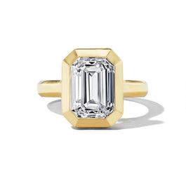 Shield-bezel-set-emerald-cut-diamond-engagement-ring