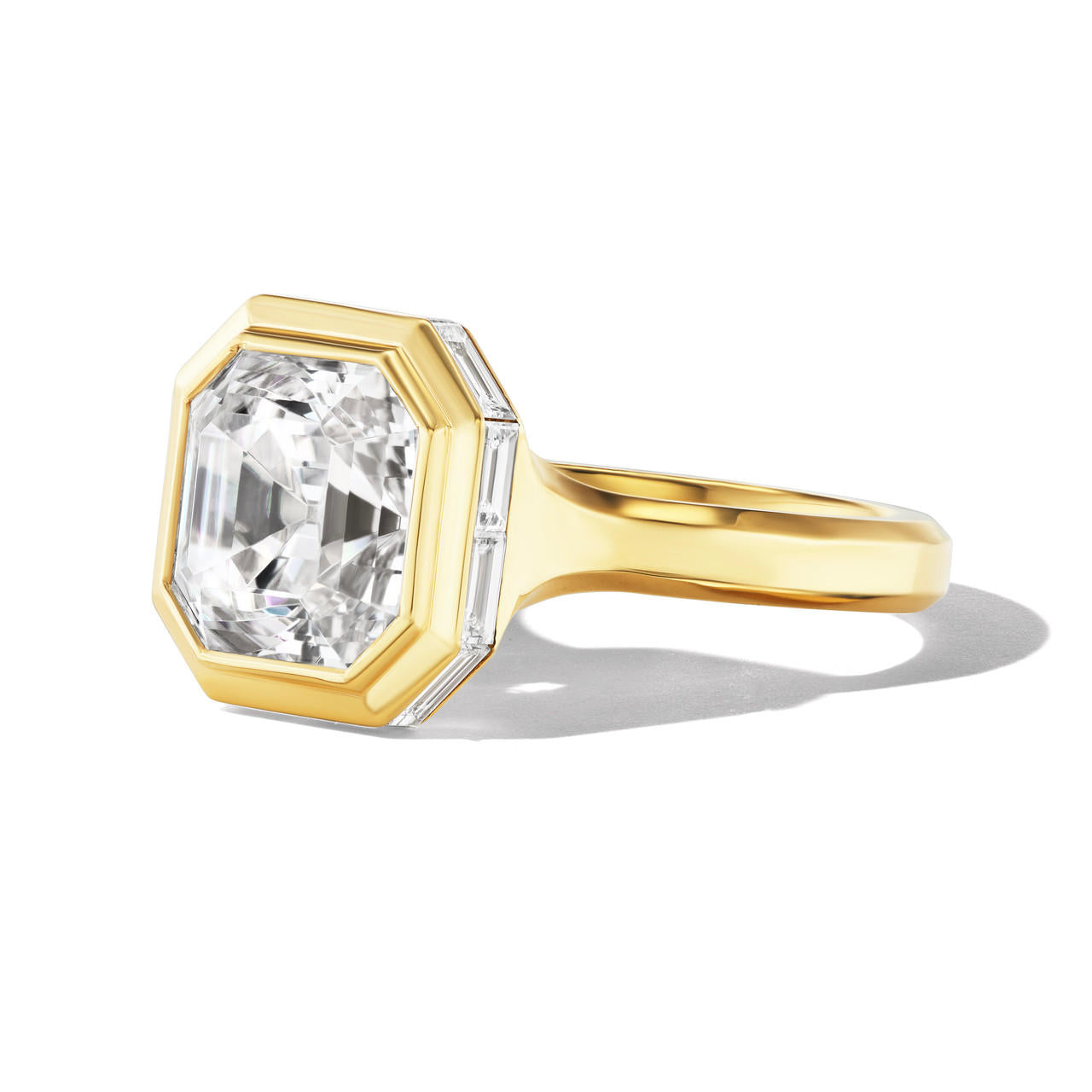 shield bezel set asscher cut diamond engagement ring in 18k yellow gold