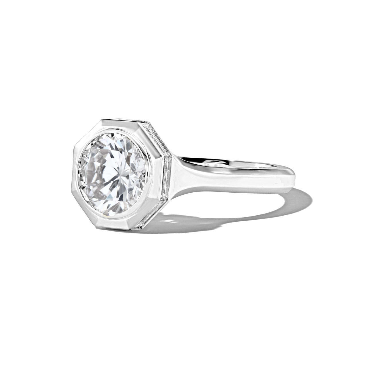 SHIELD OCTAGON BEZEL SET ROUND DIAMOND ENGAGEMENT RING IN PLATINUM