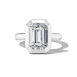 shield bezel set emerald cut diamond engagement ring in platinum