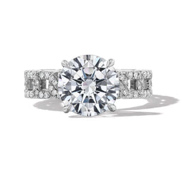 round cut diamond engagement ring with a classic 4 prong 16 pave links setting in platinum