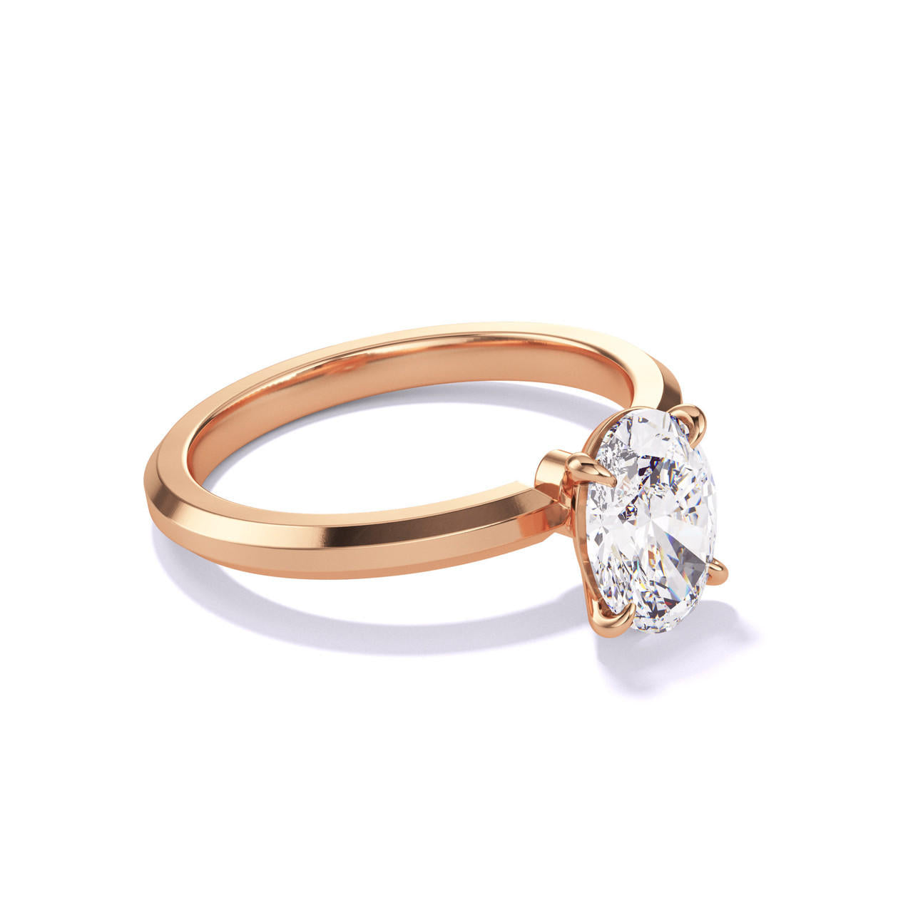 OVAL CUT DIAMOND ENGAGEMENT RING WITH A CLASSIC 4 PRONG THREE PHASES SLIM SETTING IN 18K ROSE GOLD