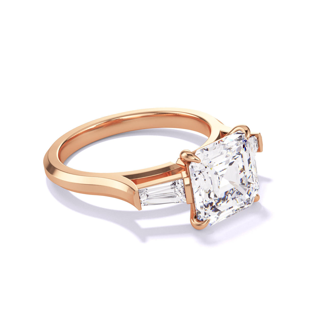 ASSCHER CUT DIAMOND ENGAGEMENT RING WITH A BAGUETTE FLANK THREE PHASES SLIM SETTING IN 18K ROSE GOLD