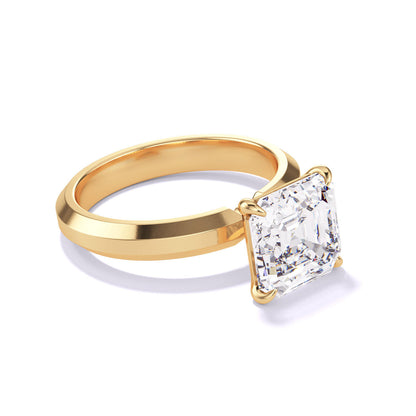 ASSCHER CUT DIAMOND ENGAGEMENT RING WITH A CLASSIC 4 PRONG THREE PHASES SETTING IN 18K YELLOW GOLD