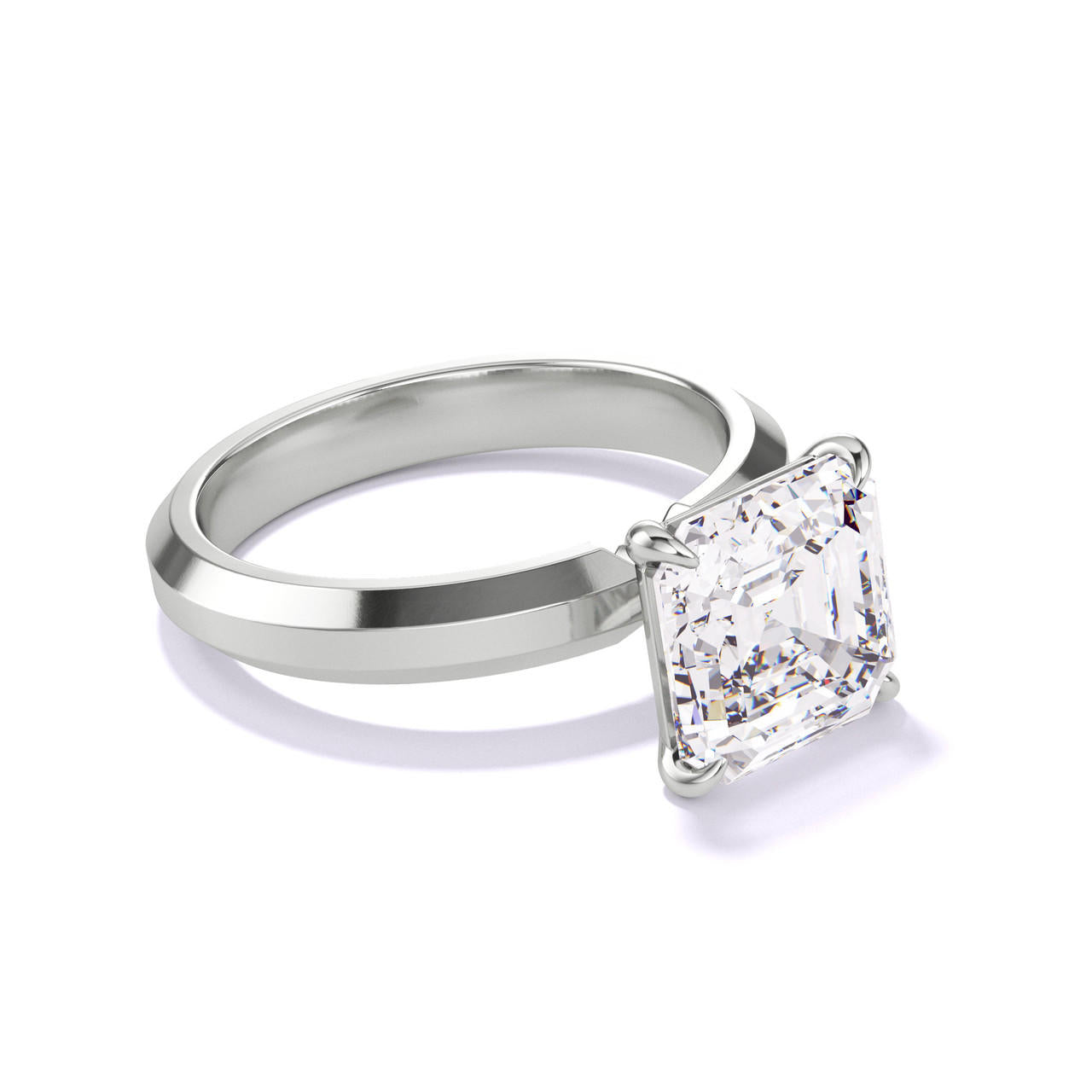 ASSCHER CUT DIAMOND ENGAGEMENT RING WITH A CLASSIC 4 PRONG THREE PHASES SETTING IN PLATINUM