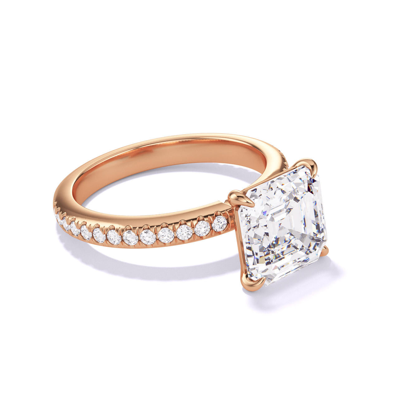 ASSCHER CUT DIAMOND ENGAGEMENT RING WITH A CLASSIC 4 PRONG THREE PHASES PAVE SETTING IN 18K ROSE GOLD
