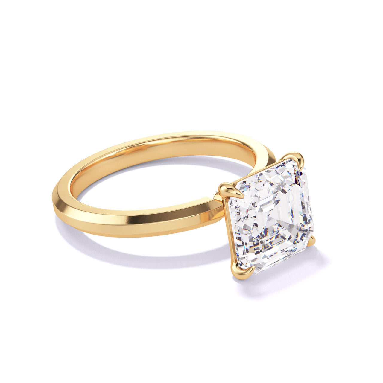 ASSCHER CUT DIAMOND ENGAGEMENT RING WITH A CLASSIC 4 PRONG THREE PHASES SLIM SETTING IN 18K YELLOW GOLD