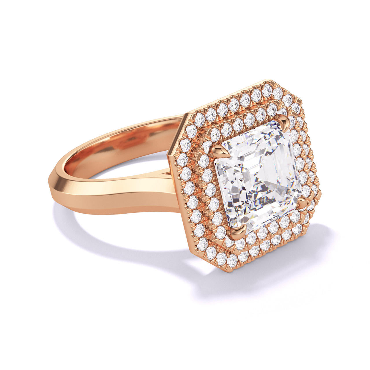 Asscher cut engagement ring with a double halo on an 18k rose gold band