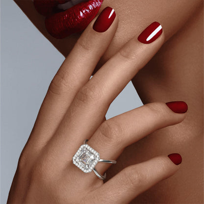 ASSCHER CUT DIAMOND ENGAGEMENT RING WITH A WRAPPED HALO AXIS SETTING IN PLATINUM