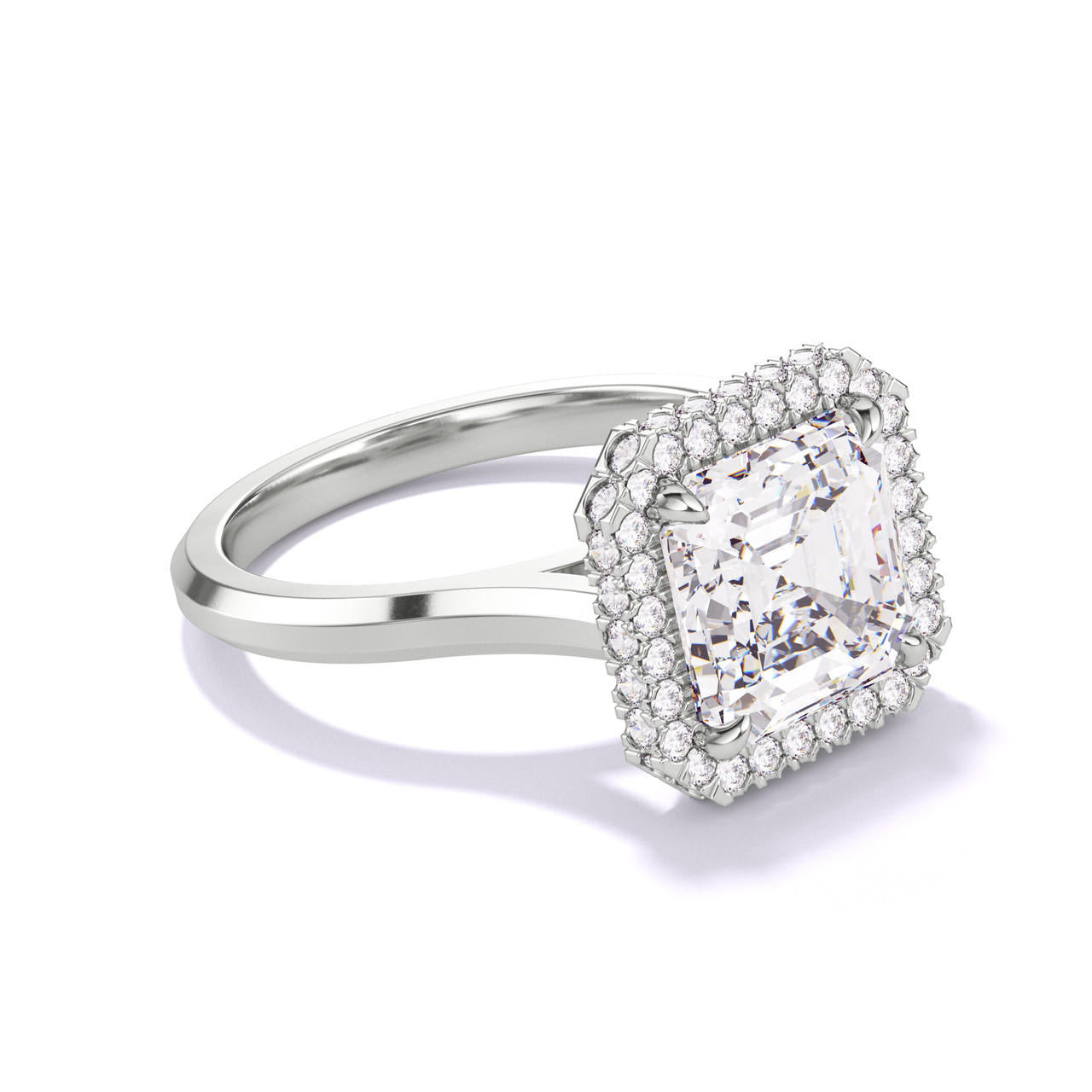 asscher engagement ring with a wrapped halo in platinum