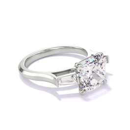 Detailed view of the signature Three Phases slim setting paired with a platinum cushion cut diamond engagement ring and classic baguette flanks.