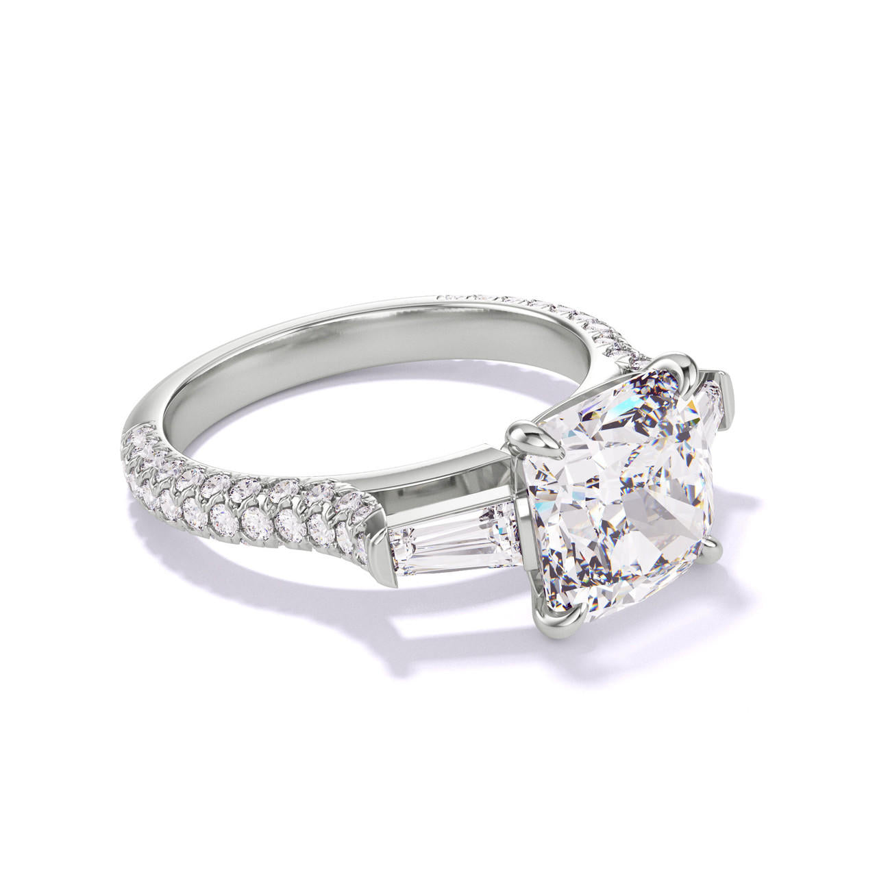 CUSHION CUT DIAMOND ENGAGEMENT RING WITH A BAGUETTE FLANK THREE PHASES TRIPLE PAVE SETTING IN PLATINUM