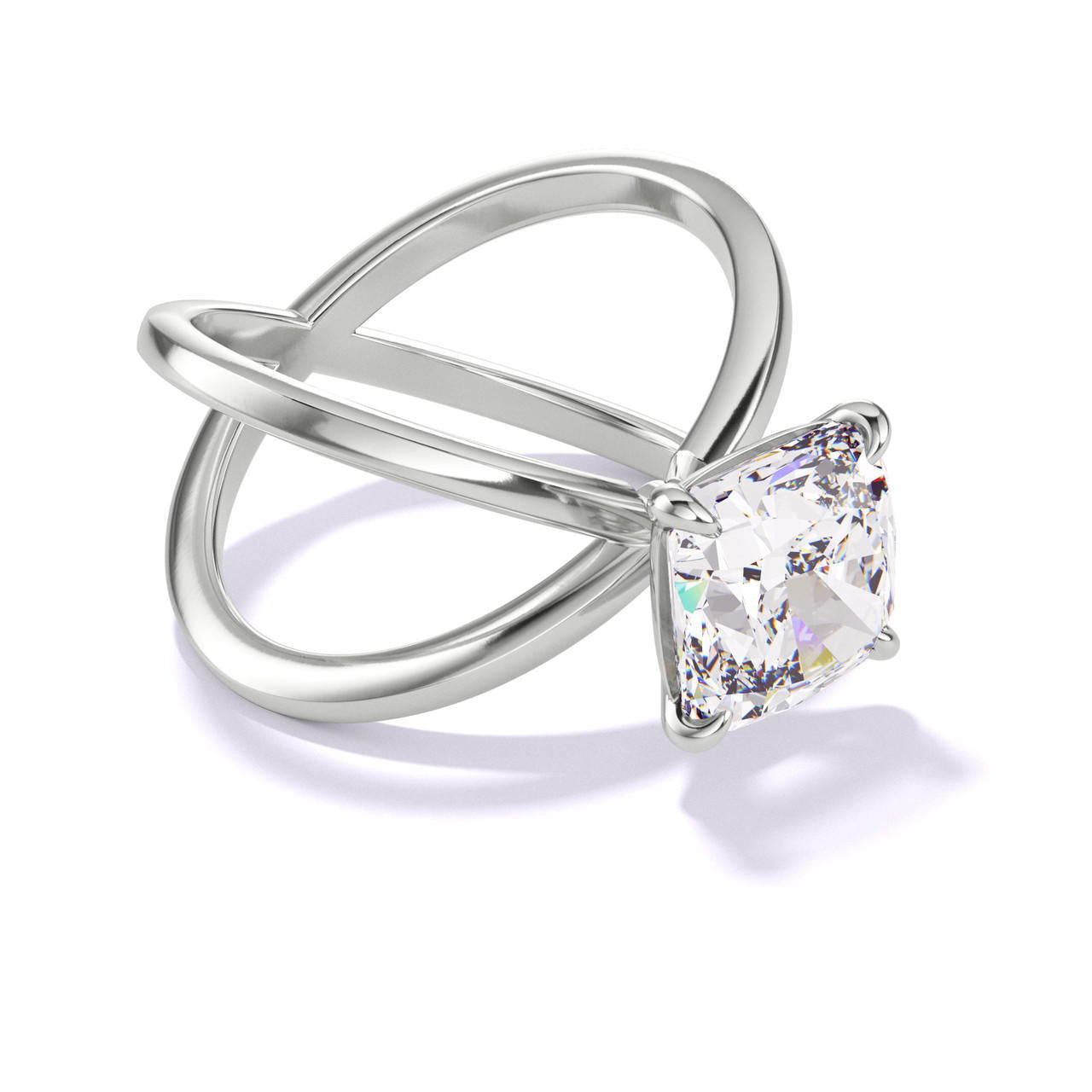 CUSHION CUT DIAMOND ENGAGEMENT RING WITH A CLASSIC 4 PRONG AXIS SETTING IN PLATINUM