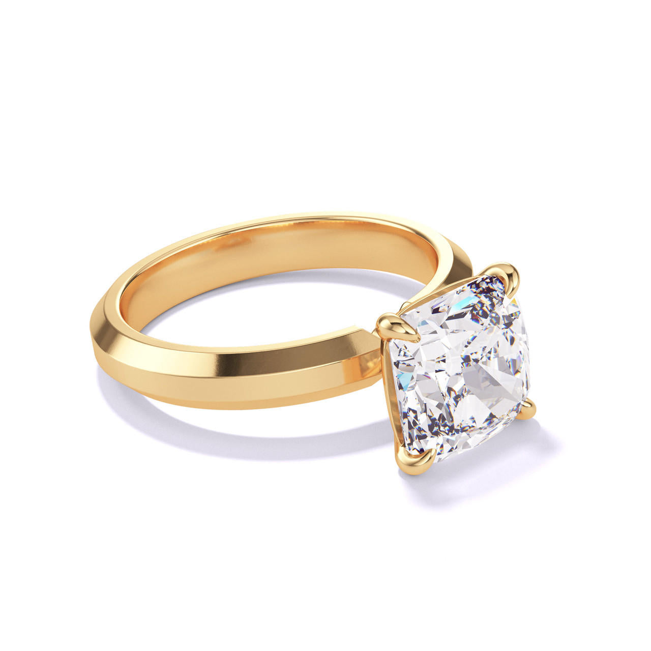 CUSHION CUT DIAMOND ENGAGEMENT RING WITH A CLASSIC 4 PRONG THREE PHASES SETTING IN 18K YELLOW GOLD