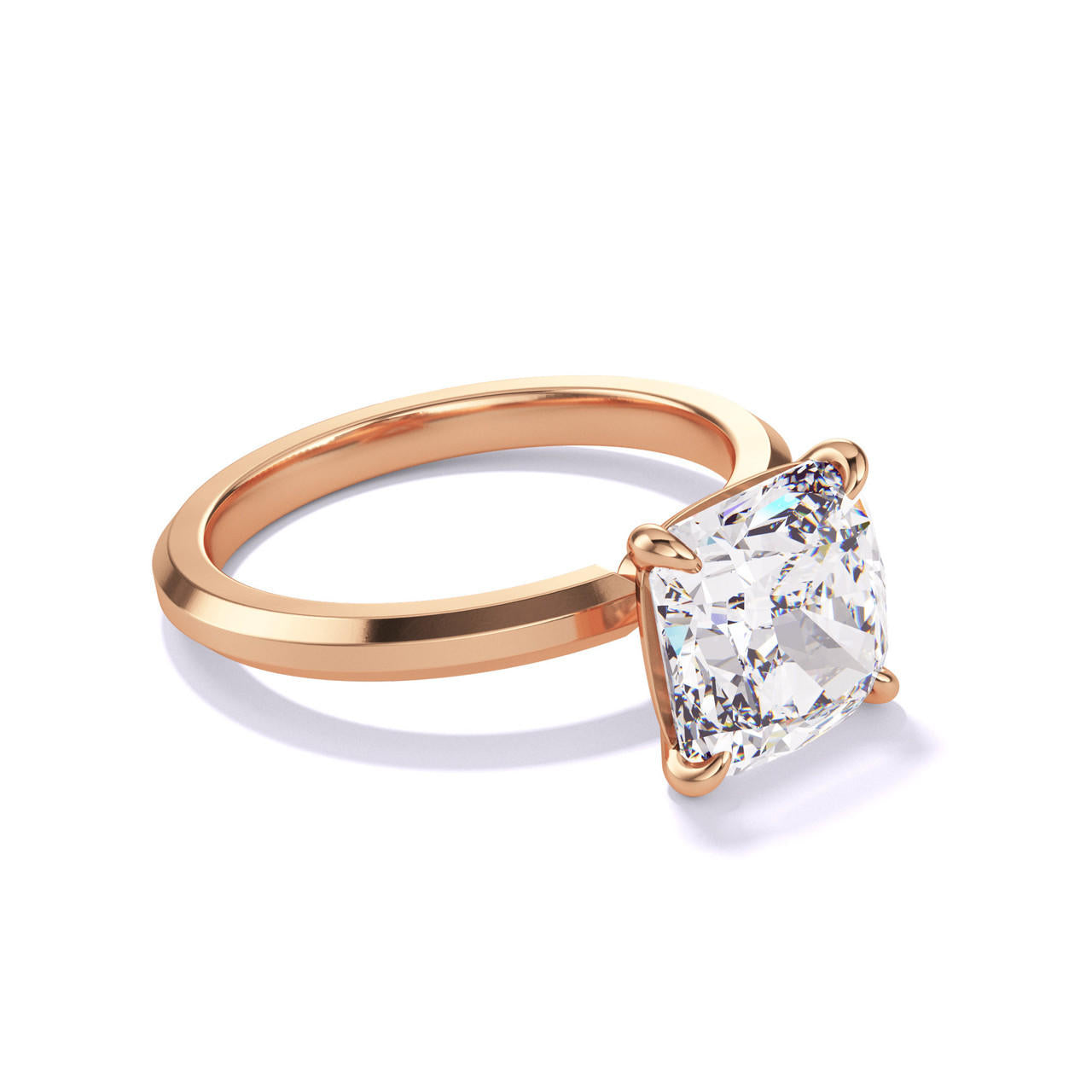 CUSHION CUT DIAMOND ENGAGEMENT RING WITH A CLASSIC 4 PRONG THREE PHASES SLIM SETTING IN 18K ROSE GOLD