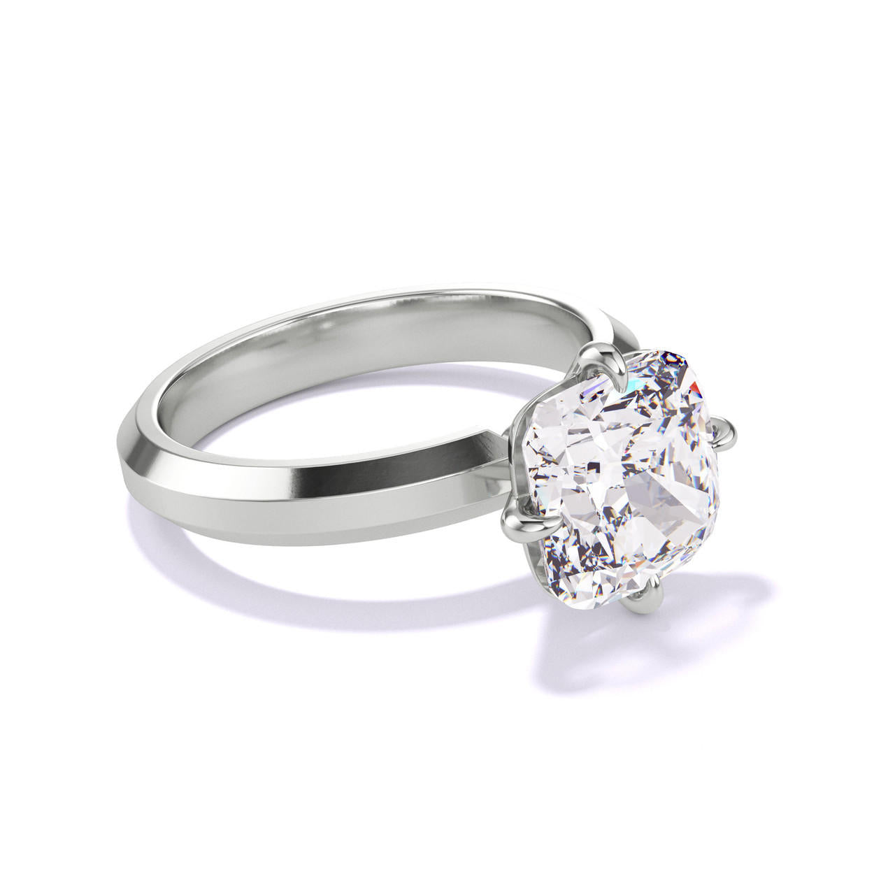 CUSHION CUT DIAMOND ENGAGEMENT RING WITH A COMPASS 4 PRONG THREE PHASES SETTING IN PLATINUM