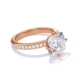 CUSHION CUT DIAMOND ENGAGEMENT RING WITH A COMPASS 4 PRONG THREE PHASES PAVE SETTING IN 18K ROSE GOLD
