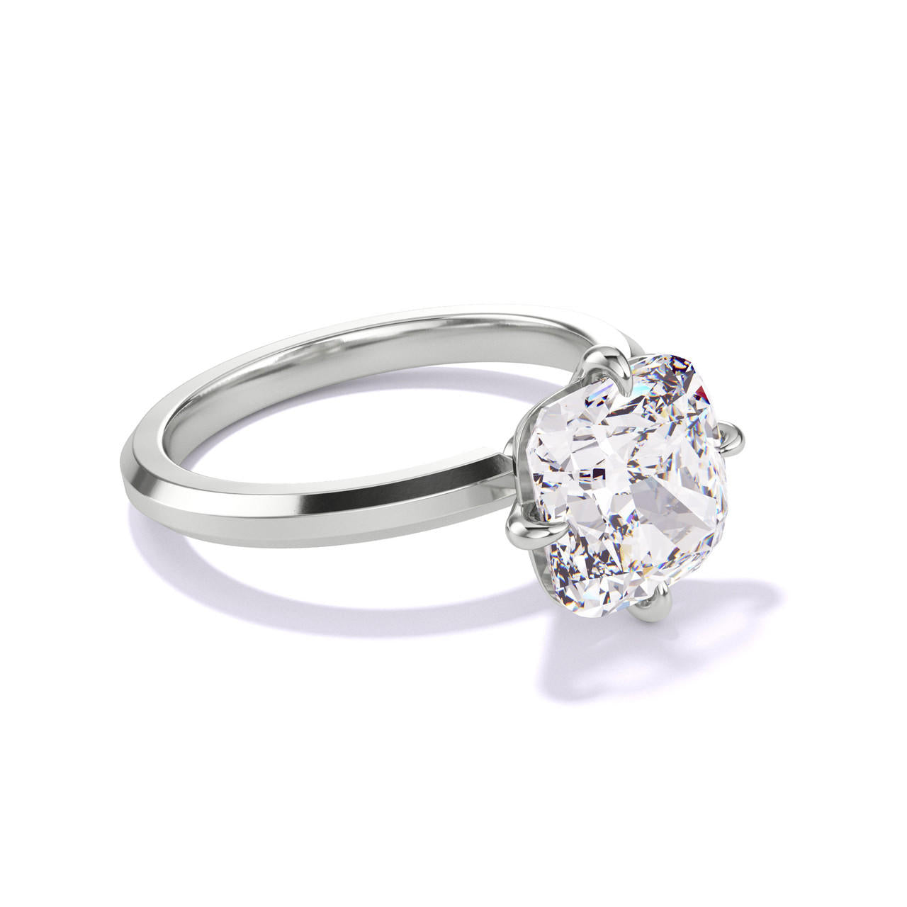 CUSHION CUT DIAMOND ENGAGEMENT RING WITH A COMPASS 4 PRONG THREE PHASES SLIM SETTING IN PLATINUM