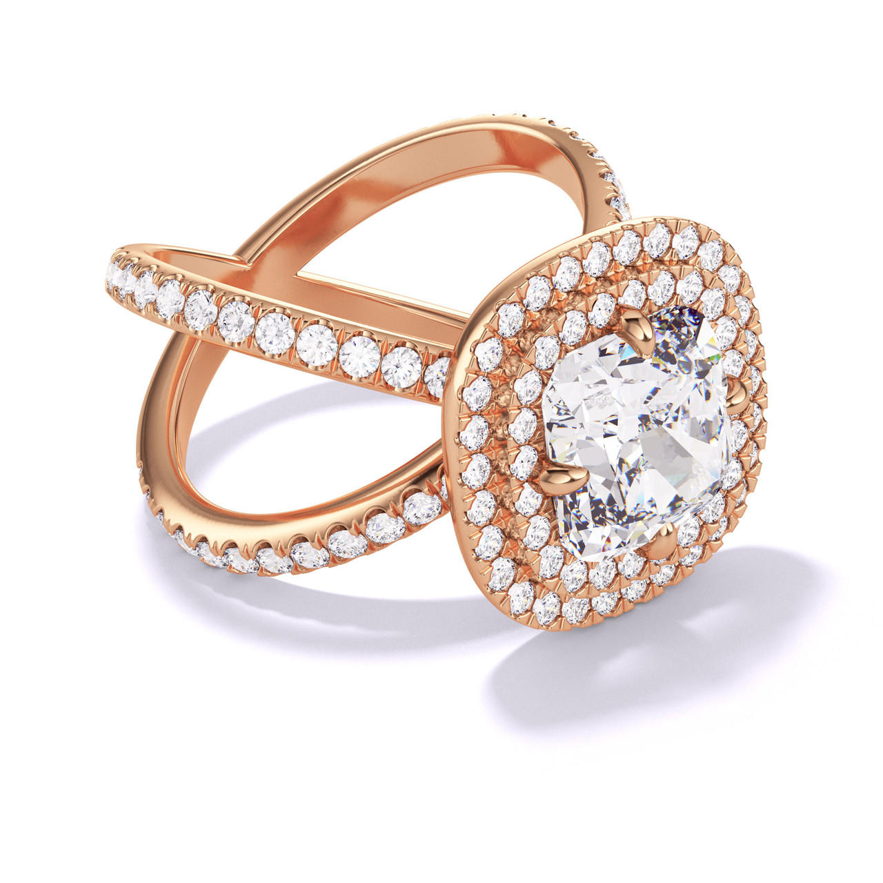 CUSHION CUT DIAMOND ENGAGEMENT RING WITH A DOUBLE HALO AXIS PAVE SETTING IN 18K ROSE GOLD