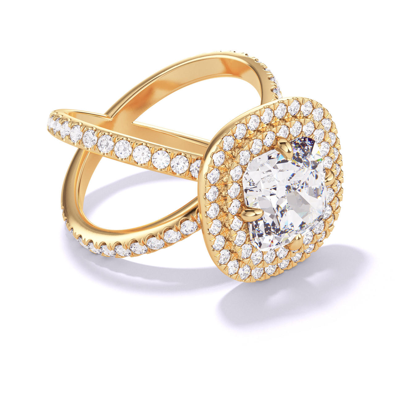 CUSHION CUT DIAMOND ENGAGEMENT RING WITH A DOUBLE HALO AXIS PAVE SETTING IN 18K YELLOW GOLD