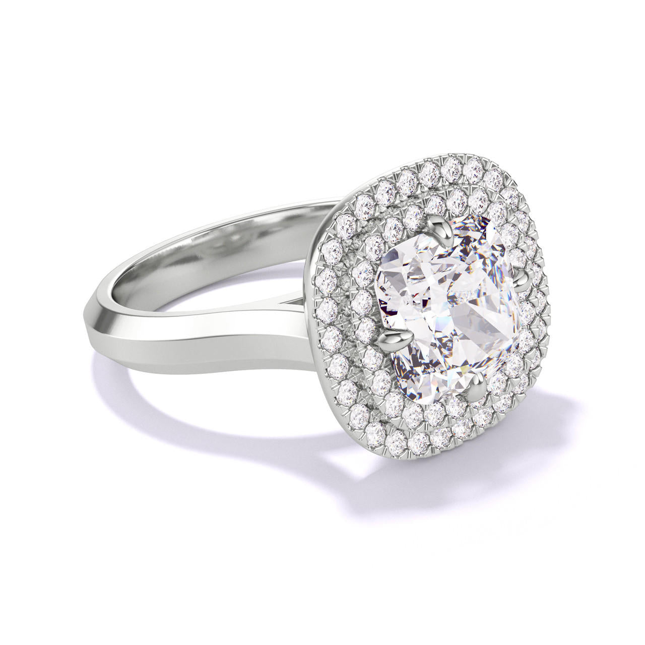 CUSHION CUT DIAMOND ENGAGEMENT RING WITH A DOUBLE HALO THREE PHASES SETTING IN PLATINUM