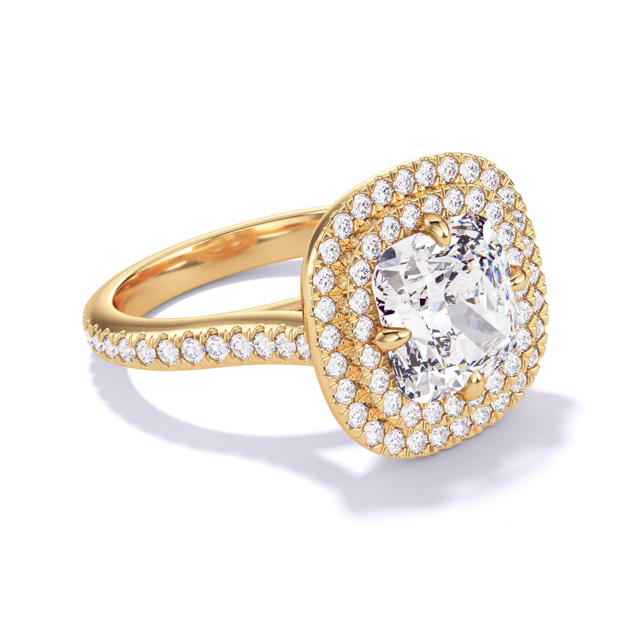 CUSHION CUT DIAMOND ENGAGEMENT RING WITH A DOUBLE HALO THREE PHASES PAVE SETTING IN 18K YELLOW GOLD