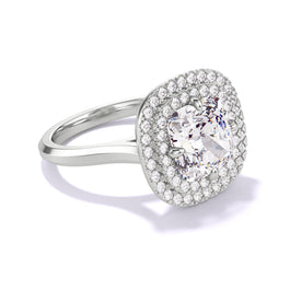 A side view of Lindsey Scoggins Studio’s Cushion Cut Diamond Engagement Ring in Platinum, featuring a double halo three phases slim setting.