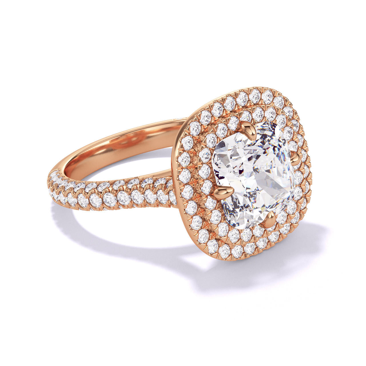 CUSHION CUT DIAMOND ENGAGEMENT RING WITH A DOUBLE HALO THREE PHASES TRIPLE PAVE SETTING IN 18K ROSE GOLD