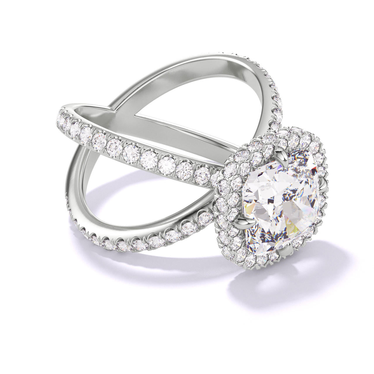 CUSHION CUT DIAMOND ENGAGEMENT RING WITH A WRAPPED HALO AXIS PAVE SETTING IN PLATINUM