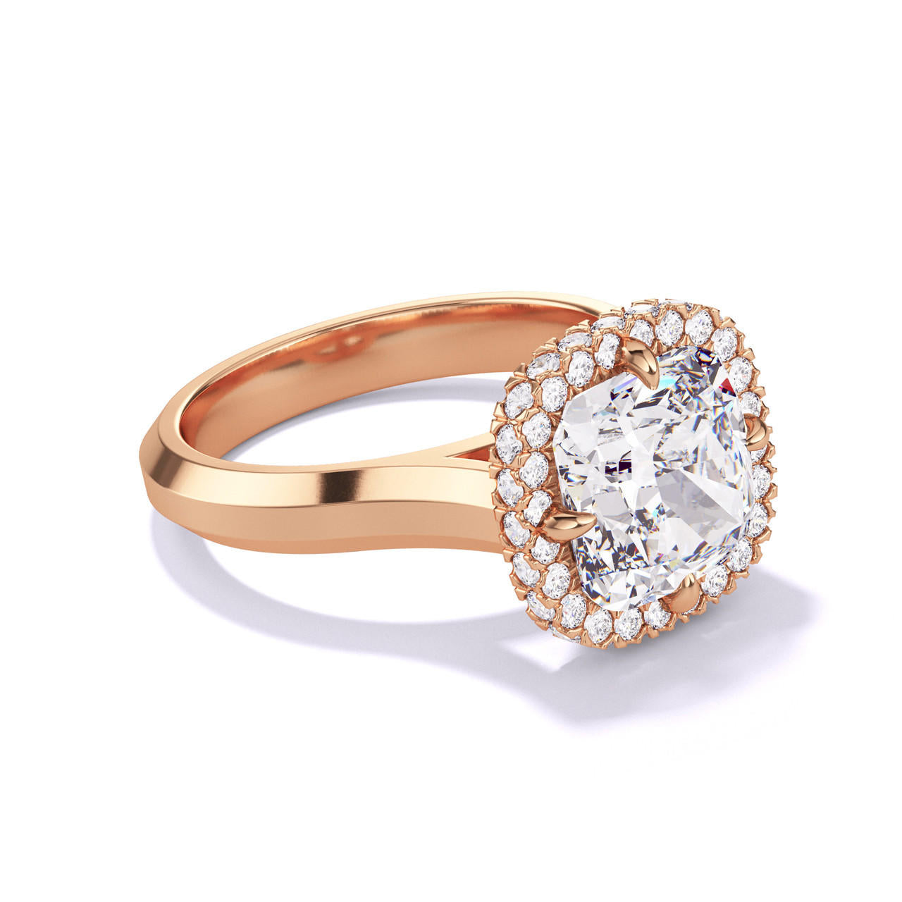 CUSHION CUT DIAMOND ENGAGEMENT RING WITH A WRAPPED HALO THREE PHASES SETTING IN 18K ROSE GOLD