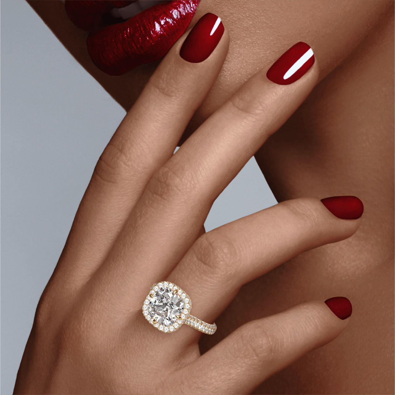CUSHION CUT DIAMOND ENGAGEMENT RING WITH A WRAPPED HALO THREE PHASES TRIPLE PAVE SETTING IN 18K YELLOW GOLD