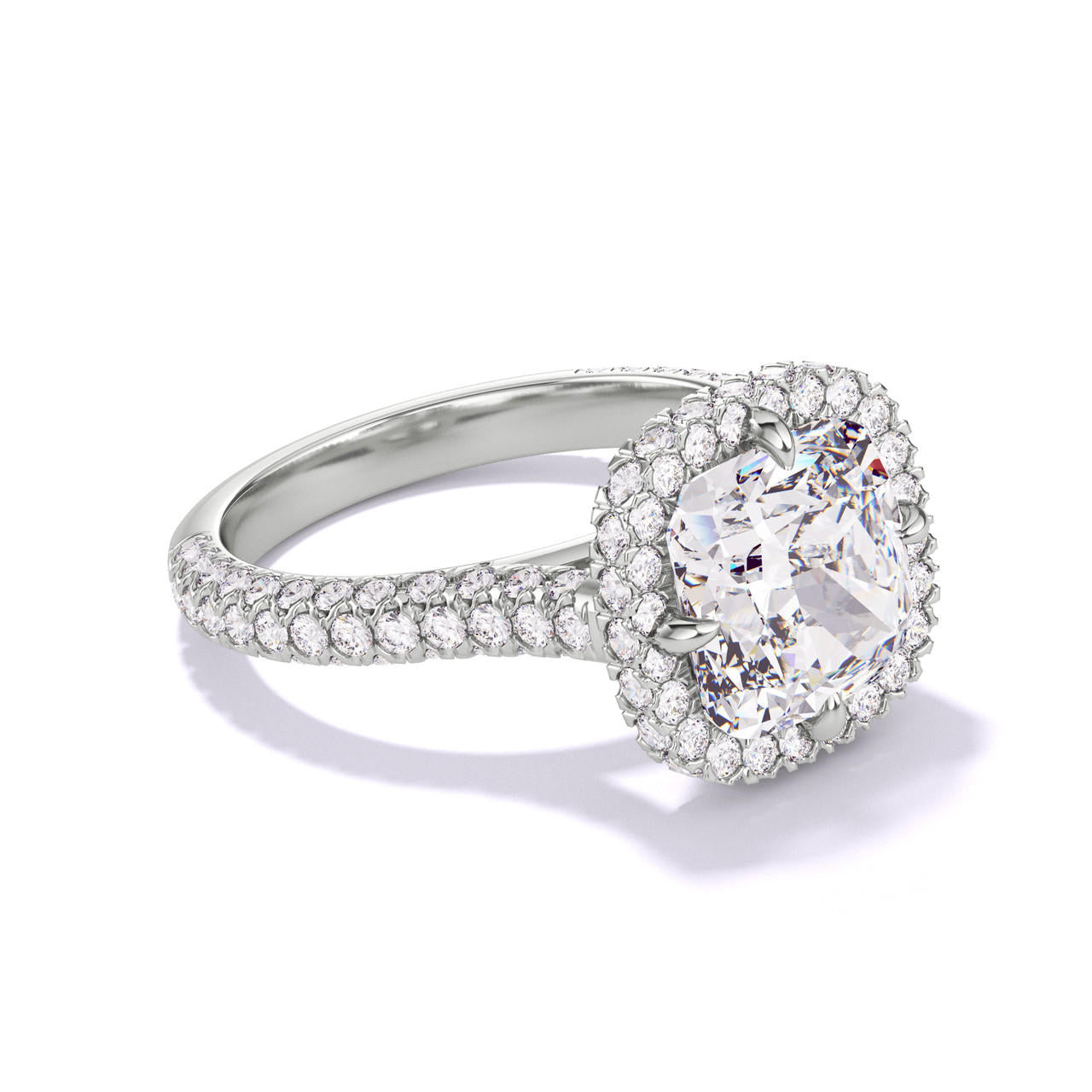 Cushion Cut Halo Engagement Ring on a Three Phases Pave Band in Platinum