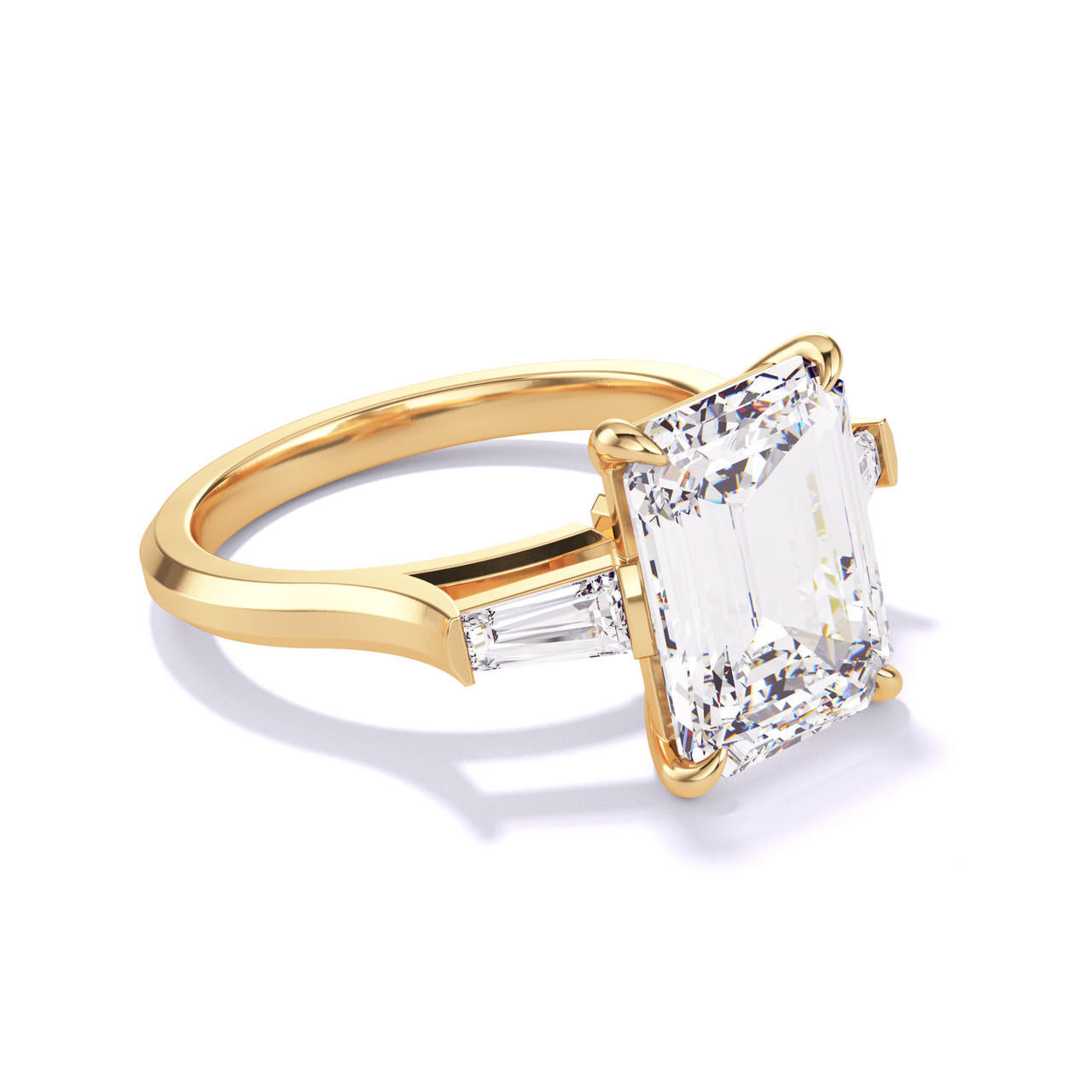 Emerald Cut Engagement Ring with Baguettes in yellow gold