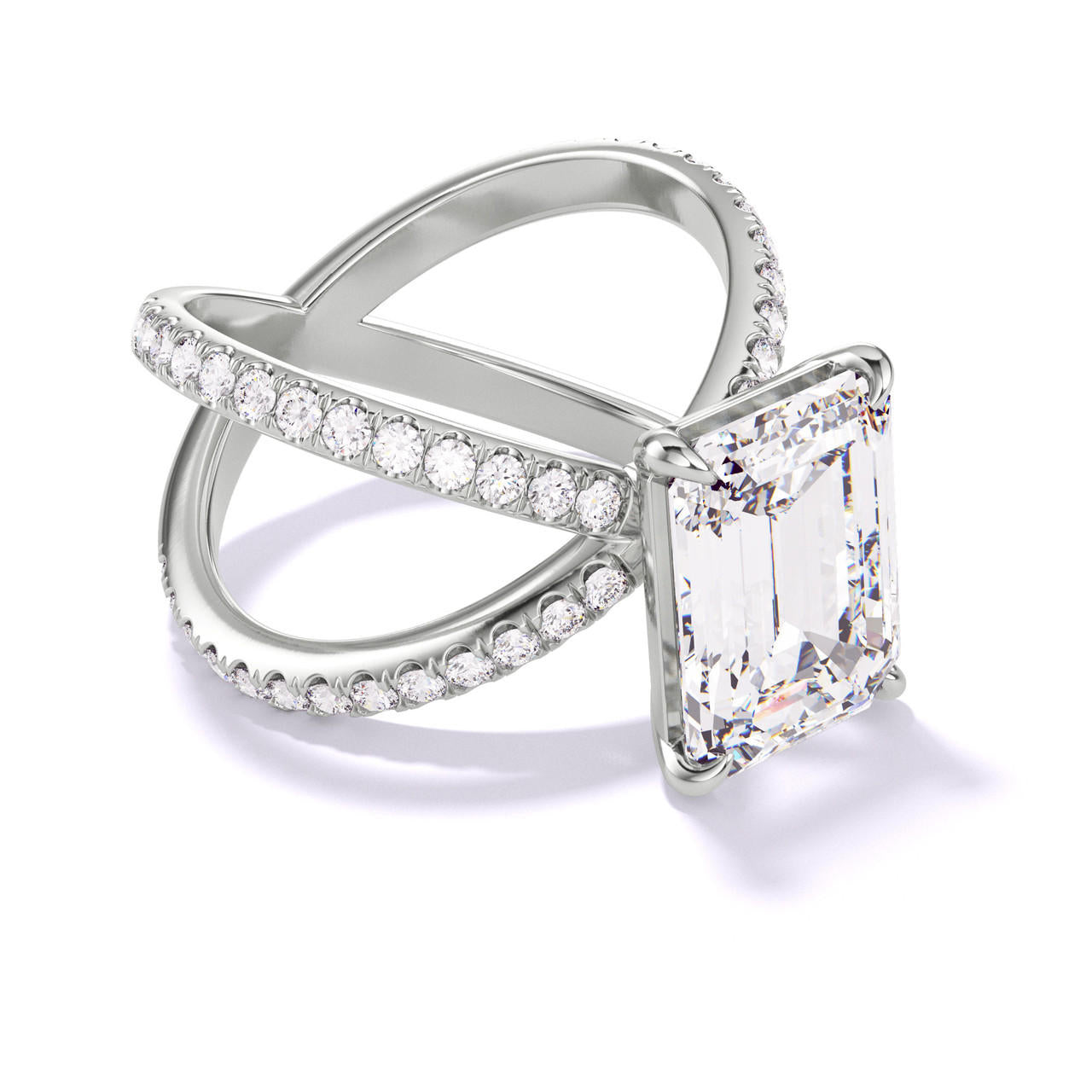 EMERALD CUT DIAMOND ENGAGEMENT RING WITH A CLASSIC 4 PRONG AXIS PAVE SETTING IN PLATINUM