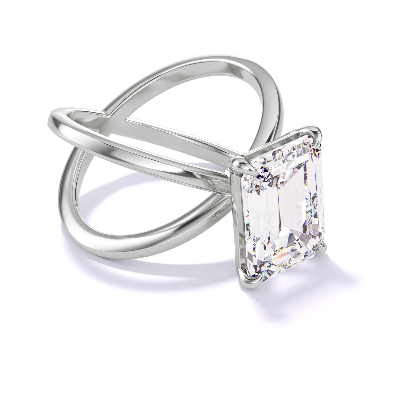 EMERALD CUT DIAMOND ENGAGEMENT RING WITH A CLASSIC 4 PRONG AXIS SETTING IN PLATINUM