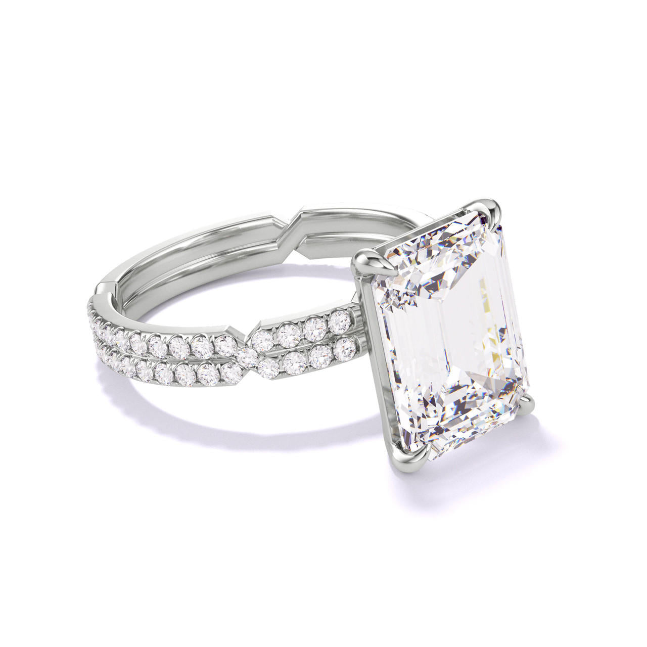 EMERALD CUT DIAMOND ENGAGEMENT RING WITH A CLASSIC 4 PRONG CHANCE PAVE SETTING IN PLATINUM