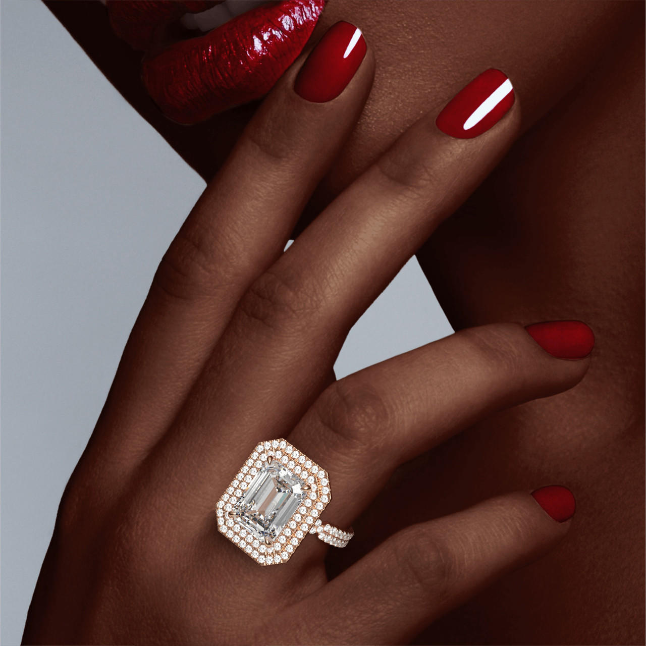 EMERALD CUT DIAMOND ENGAGEMENT RING WITH A DOUBLE HALO CHANCE PAVE SETTING IN 18K ROSE GOLD