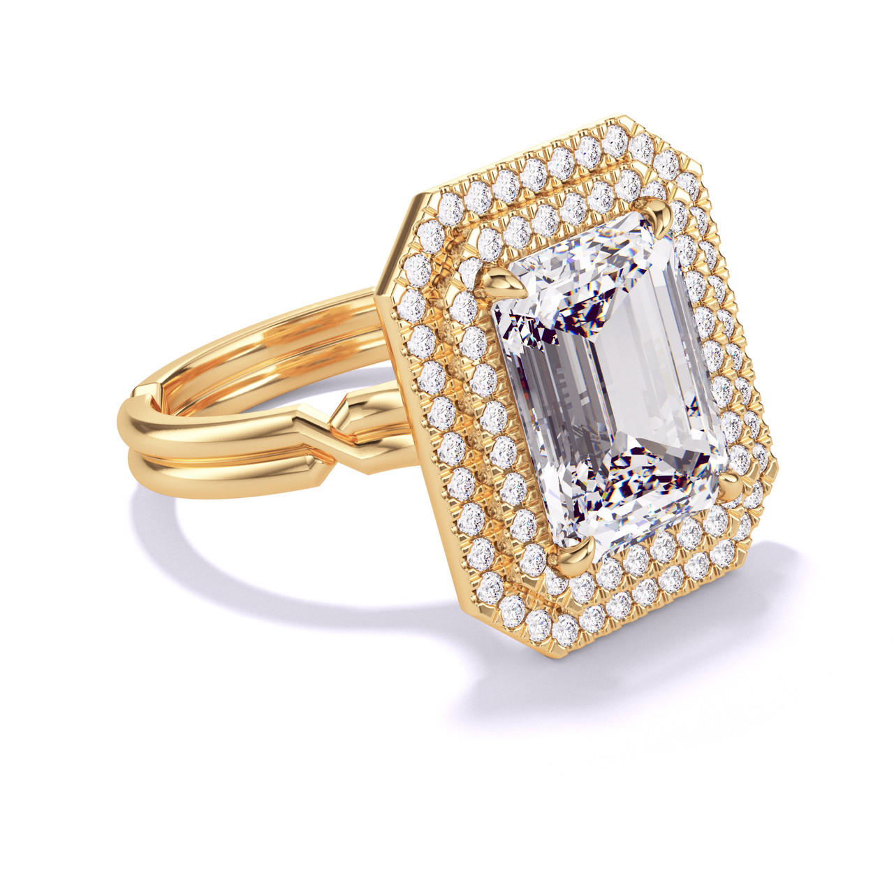 EMERALD CUT DIAMOND ENGAGEMENT RING WITH A DOUBLE HALO CHANCE SETTING IN 18K YELLOW GOLD