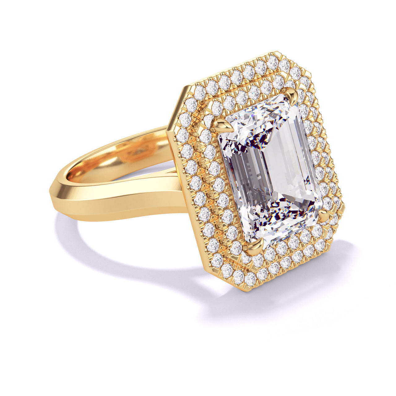 EMERALD CUT DIAMOND ENGAGEMENT RING WITH A DOUBLE HALO THREE PHASES SETTING IN 18K YELLOW GOLD