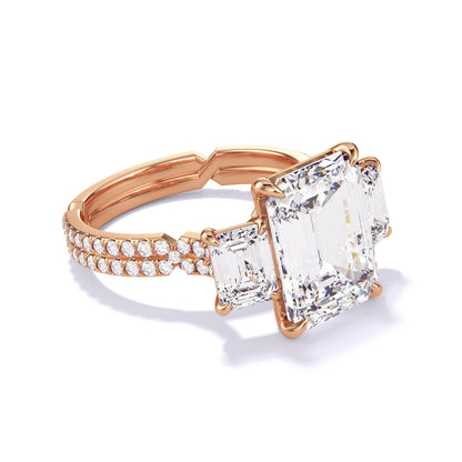 Rose Gold Emerald Cut Three Stone Engagement Ring with a Pave Chance Setting