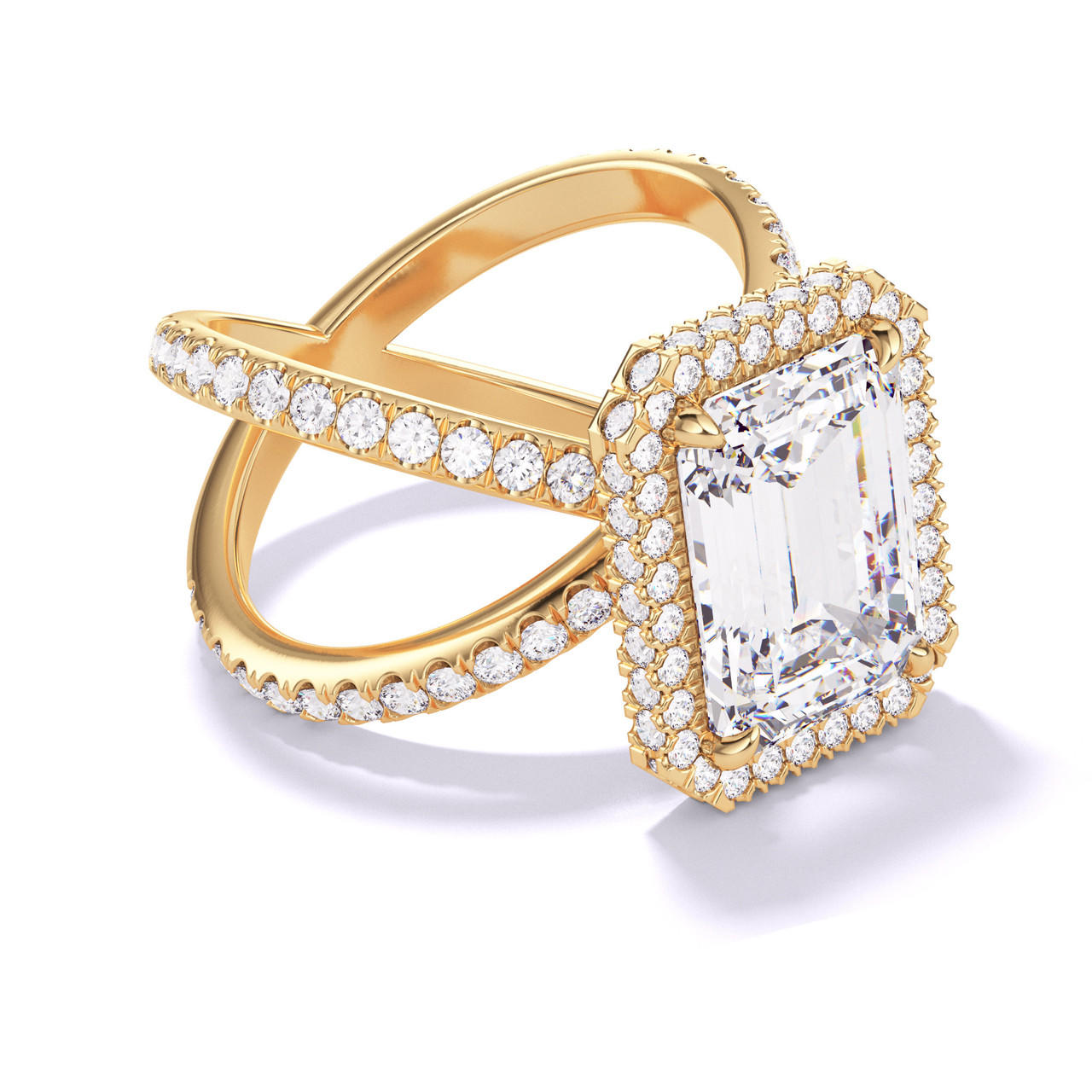 EMERALD CUT DIAMOND ENGAGEMENT RING WITH A WRAPPED HALO AXIS PAVE SETTING IN 18K YELLOW GOLD